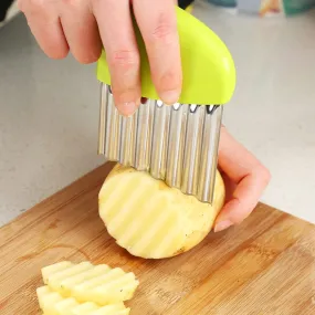 Wave onion potato slices wrinkled french fries salad corrugated cutting chopped potato slices knife
