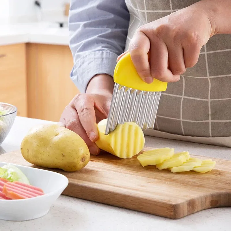 Wave onion potato slices wrinkled french fries salad corrugated cutting chopped potato slices knife