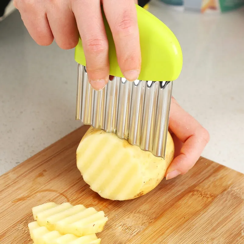 Wave onion potato slices wrinkled french fries salad corrugated cutting chopped potato slices knife